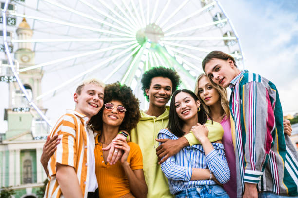 istock Group of multiethnics young friends having fun together 1457137318