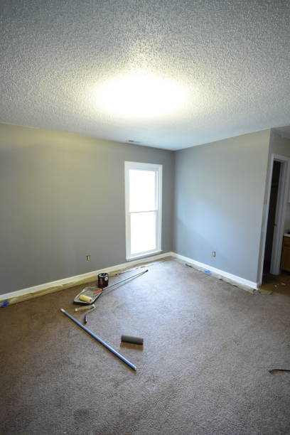 istock Fresh Coat Of Gray Paint In Room 1457137840