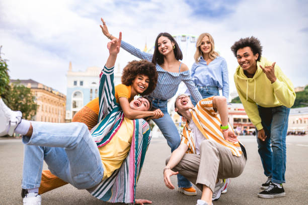 istock Group of multiethnics young friends having fun together 1457138005