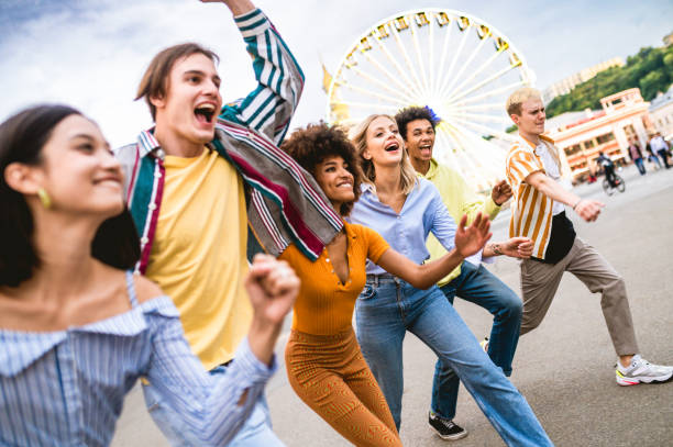 istock Group of multiethnics young friends having fun together 1457138324