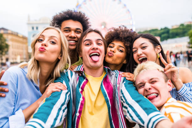 istock Group of multiethnics young friends having fun together 1457138540