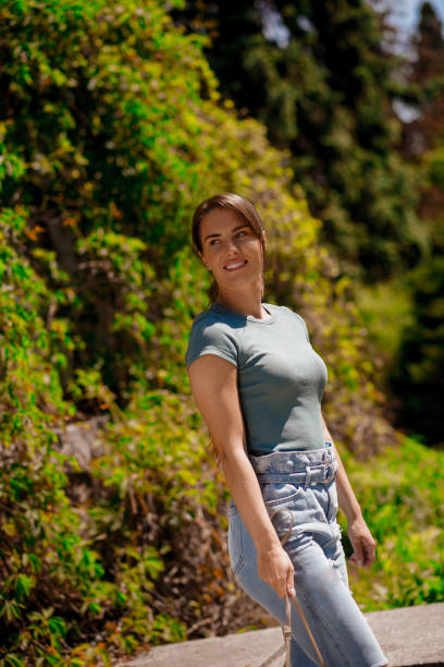 istock Cute young woman having a walk on a sunny day 1457139705