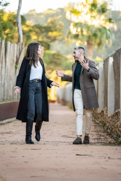 istock A couple walking on a path and arguing 1457141968