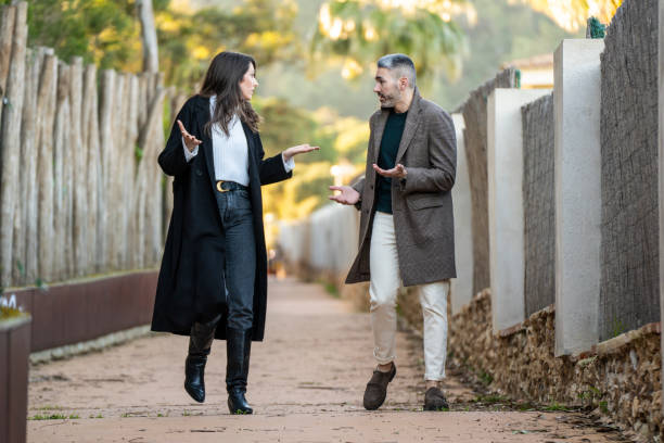istock A couple walking on a path and arguing 1457142377