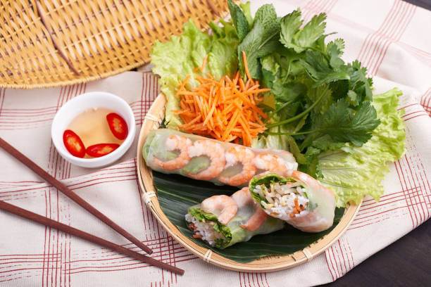 istock Fresh Vietnamese salad rolls with shrimps on a plate 1457143828