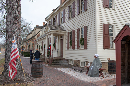 Williamsburg, Virginia: December 9, 2021: Colonial Williamsburg on a sunny day. Colonial Williamsburg is a popular tourist attraction.