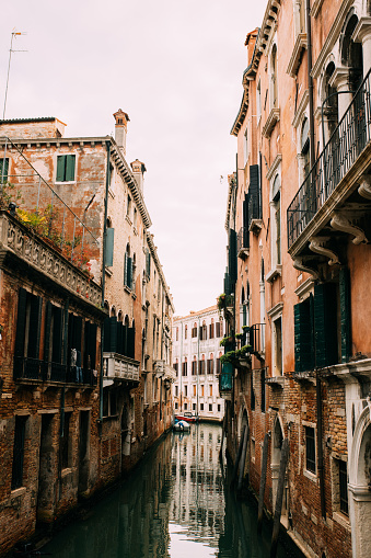 Building exteriors along the canals in Venice Italy stock photo
