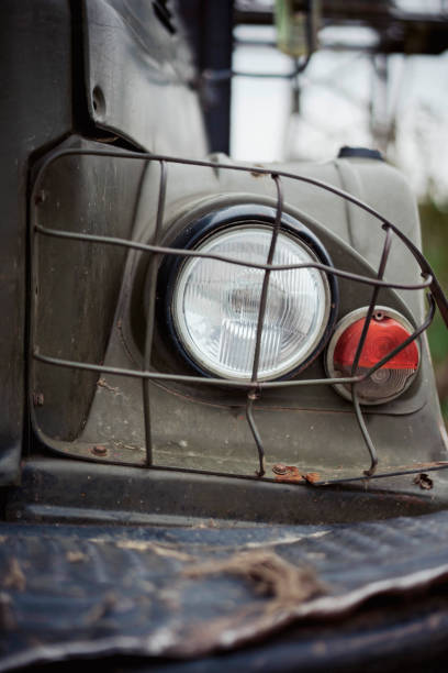 istock Vintage green car headlight and turn signal 1457150393