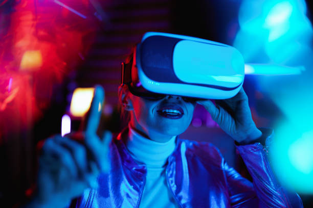 istock smiling female in vr headset exploring metaverse 1457150976