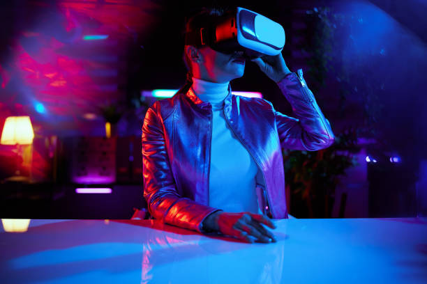 istock stylish woman in vr headset in modern office 1457150979