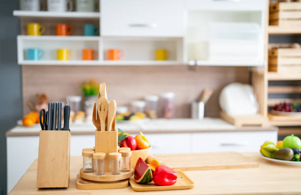 istock Modern kitchen compose with several types of equipment and tools on table and in the background and no people in image. 1457152016