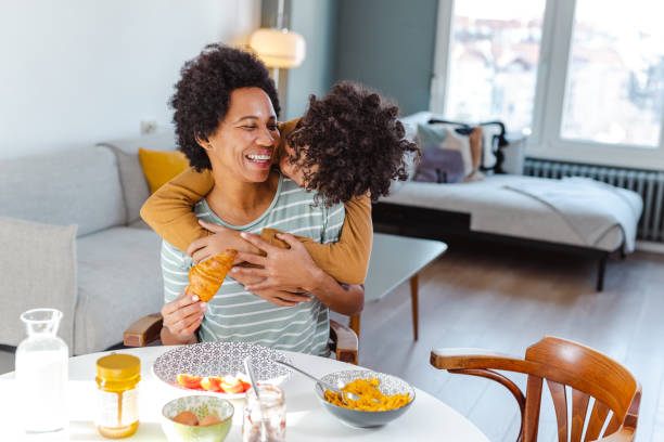 istock Happy young boy hugging his mother 1457153655