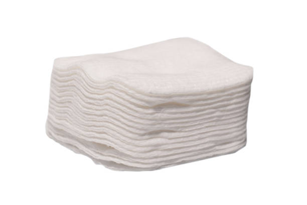 istock Stack of white cotton sponges isolated on a white background. 1457156872