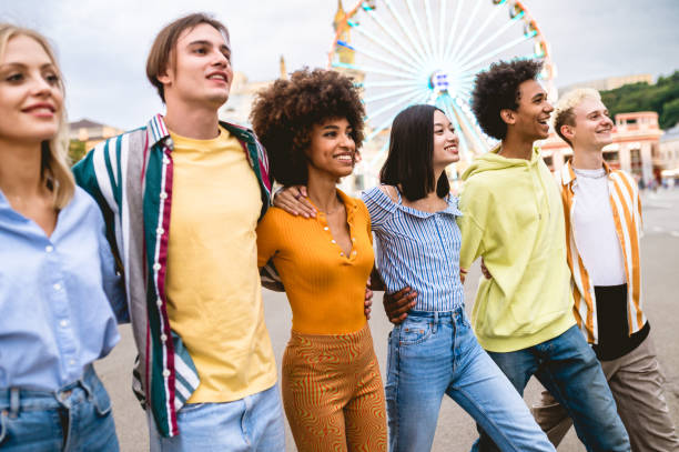 istock Group of multiethnics young friends having fun together 1457157087