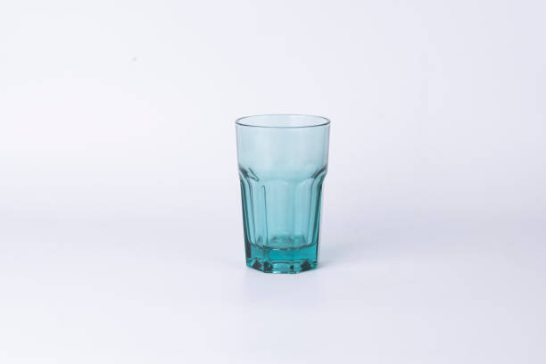 istock TURQUOISE COLOR GLASS ON WHITE BACKGROUND 1457162404