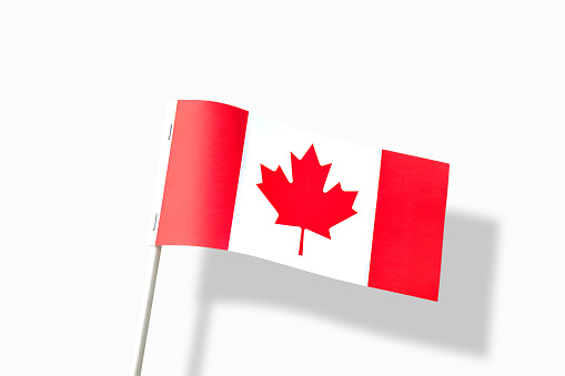 Canadian flag isolated cutout on white background with shadow