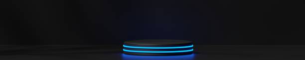 istock Podium with neon glow on a black background, 3d render 1457173700