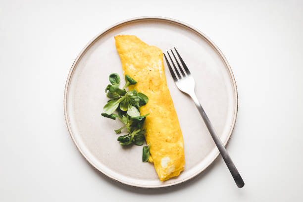 istock French omelette with salad. 1457175611