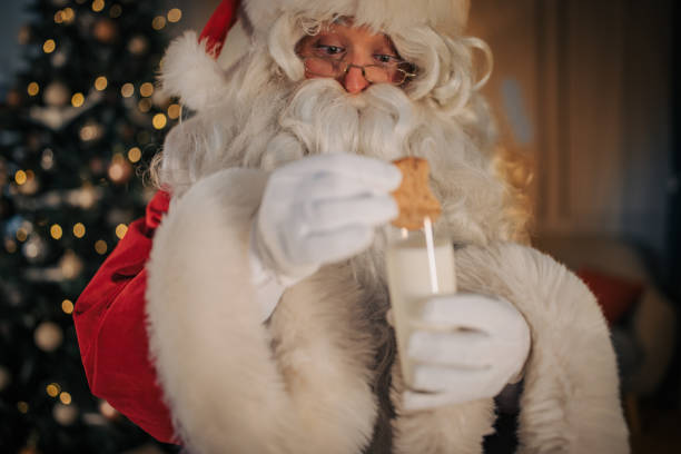 istock Santa Claus having a cookie 1457176959