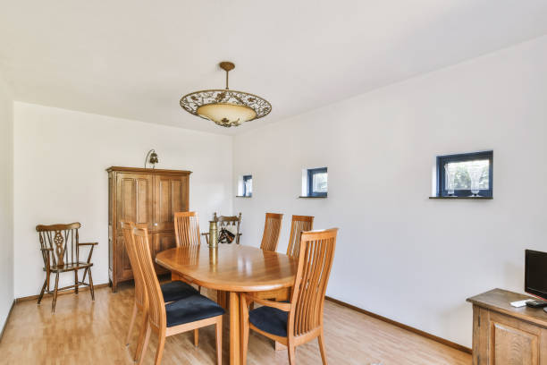 istock Dining zone with pendant lamp in living room 1457178843
