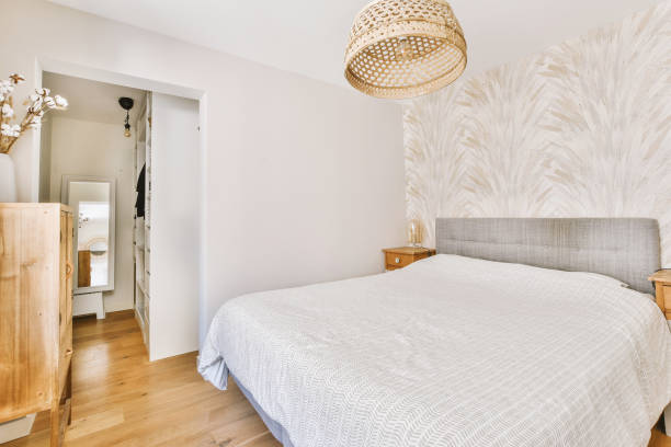 istock Light bedroom with wooden wardrobe 1457179115