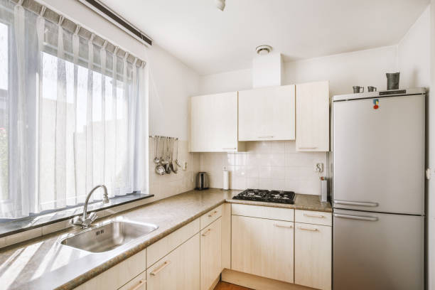 istock Interior of modern kitchen with white furniture 1457179723