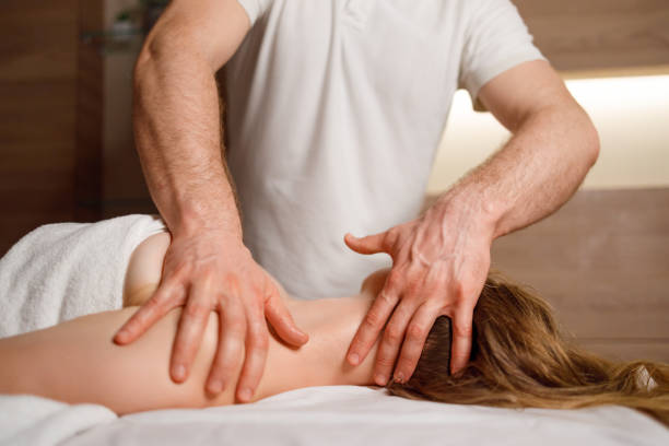 istock Neck massage in a massage clinic 1457182313