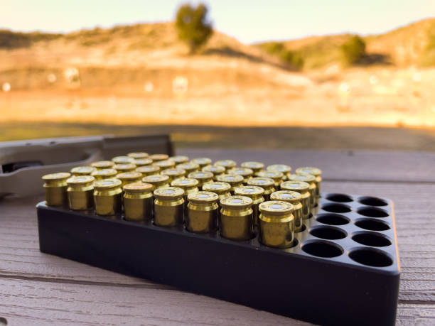 istock Tray of 9mm Lugger Bullet Rounds on Table at Shooting Range 1457183069