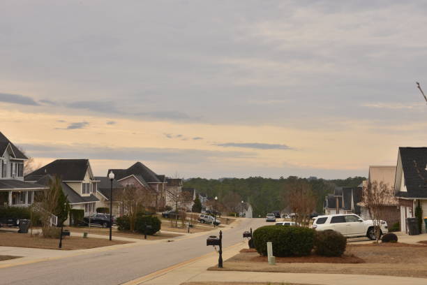 istock Suburban Street Heading Downhill 1457183118