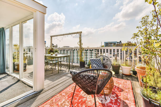 istock Bright balcony with chair and door 1457183211
