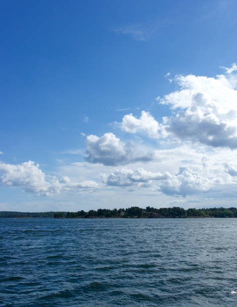 Scenic view of sea against blue sky