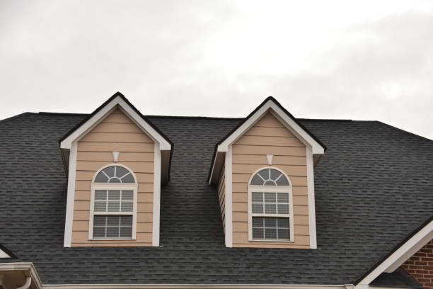 istock Two Upstair Windows On A House 1457184092