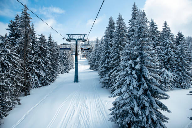 istock Ski lift on snowy winter day 1457189268