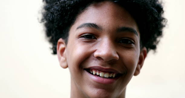 istock Happy mixed race young boy smiling 1457189949