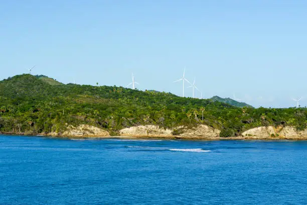 View of windmills generating electricity in Puerto Plata Dominican Republic Island.