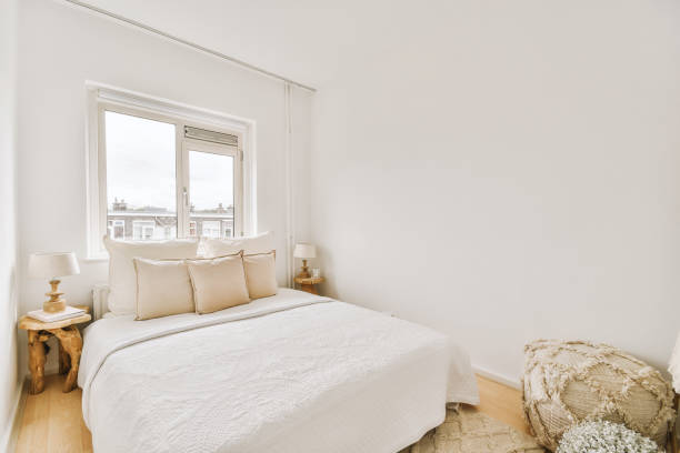 istock Light bedroom with wooden wardrobe 1457196723