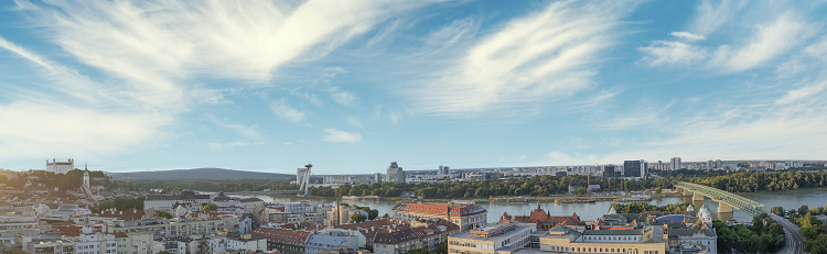 Panoramic aerial view of Bratislava, Slovakia. Aerial view of city castle and skyline at sunset.