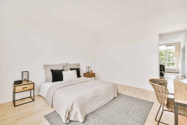 istock Light bedroom with wooden wardrobe 1457197651