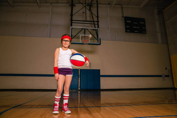 istock Retro Girl Basketball Player 1457199953
