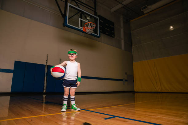 istock Retro Boy Basketball Player 1457199962
