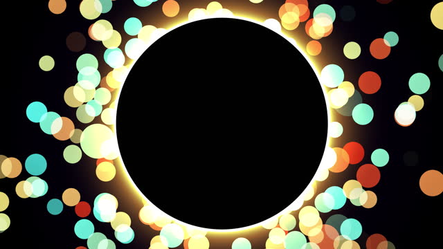 Seamless loop. Colorful glowing light circle on black background. Holiday and birthday template. Bright glitter christmas or valentines background.