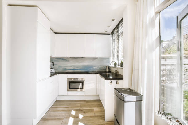 istock Interior of modern kitchen with white furniture 1457204481