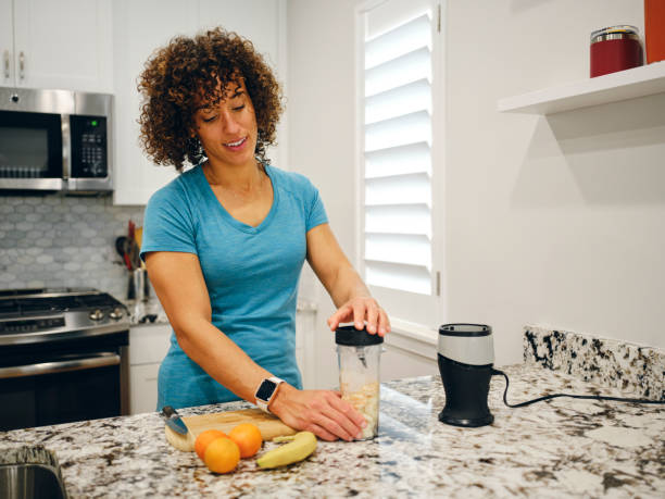 istock Woman Making a Smoothie 1457205112