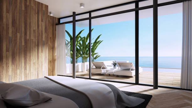 istock Luxury pool villa bedroom sea view on beach - 3D rendering 1457206205