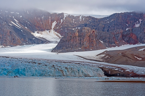 Ice and Rocks in the High Arctic at the Fourteenth of July Glacier in the Svalbard Islands