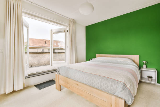 istock Light bedroom with wooden wardrobe 1457207560