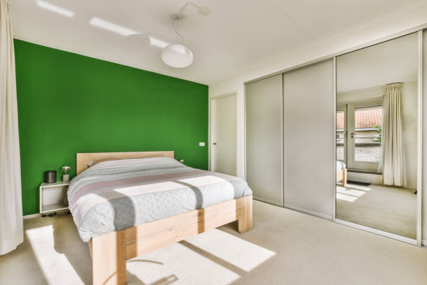 istock Light bedroom with wooden wardrobe 1457208179