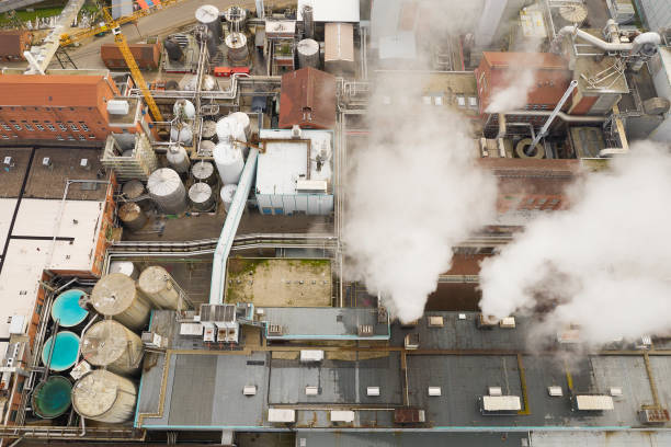 istock Smoke over Paper Mill, Aerial View 1457209078