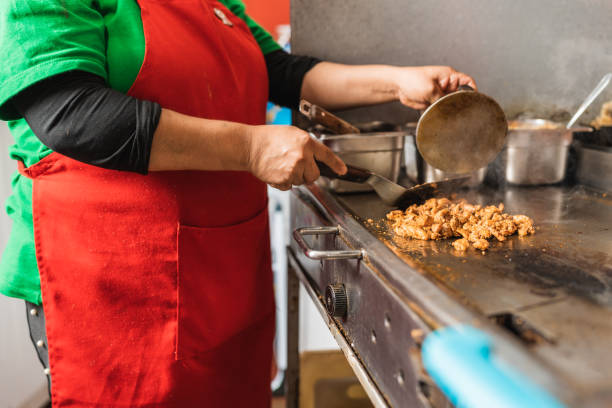 istock Chef cooking meat for tacos in a restaurant 1457218478