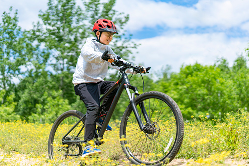 A boy riding mountain bike